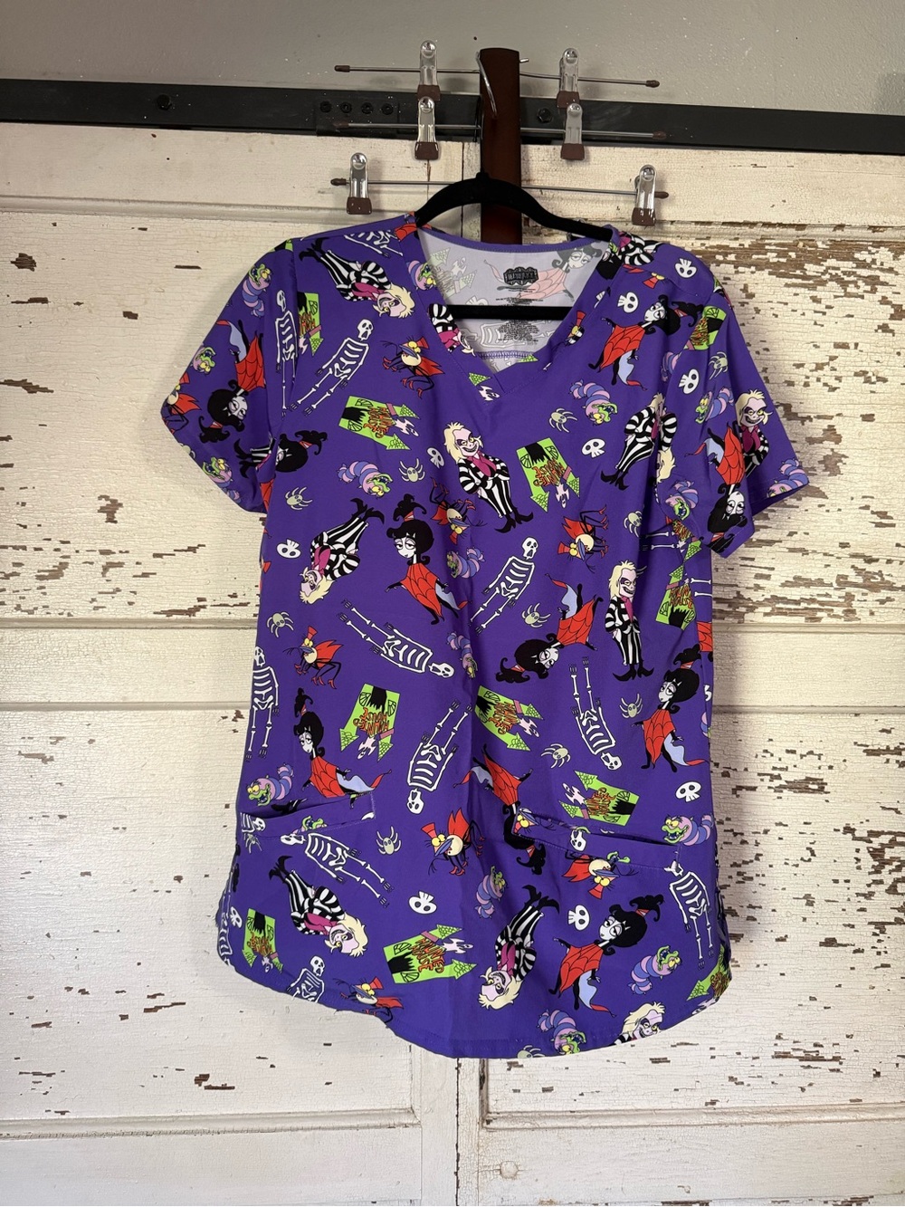 Disney Purple Scrub Top with Multicolor Beetlejuice size small/medium